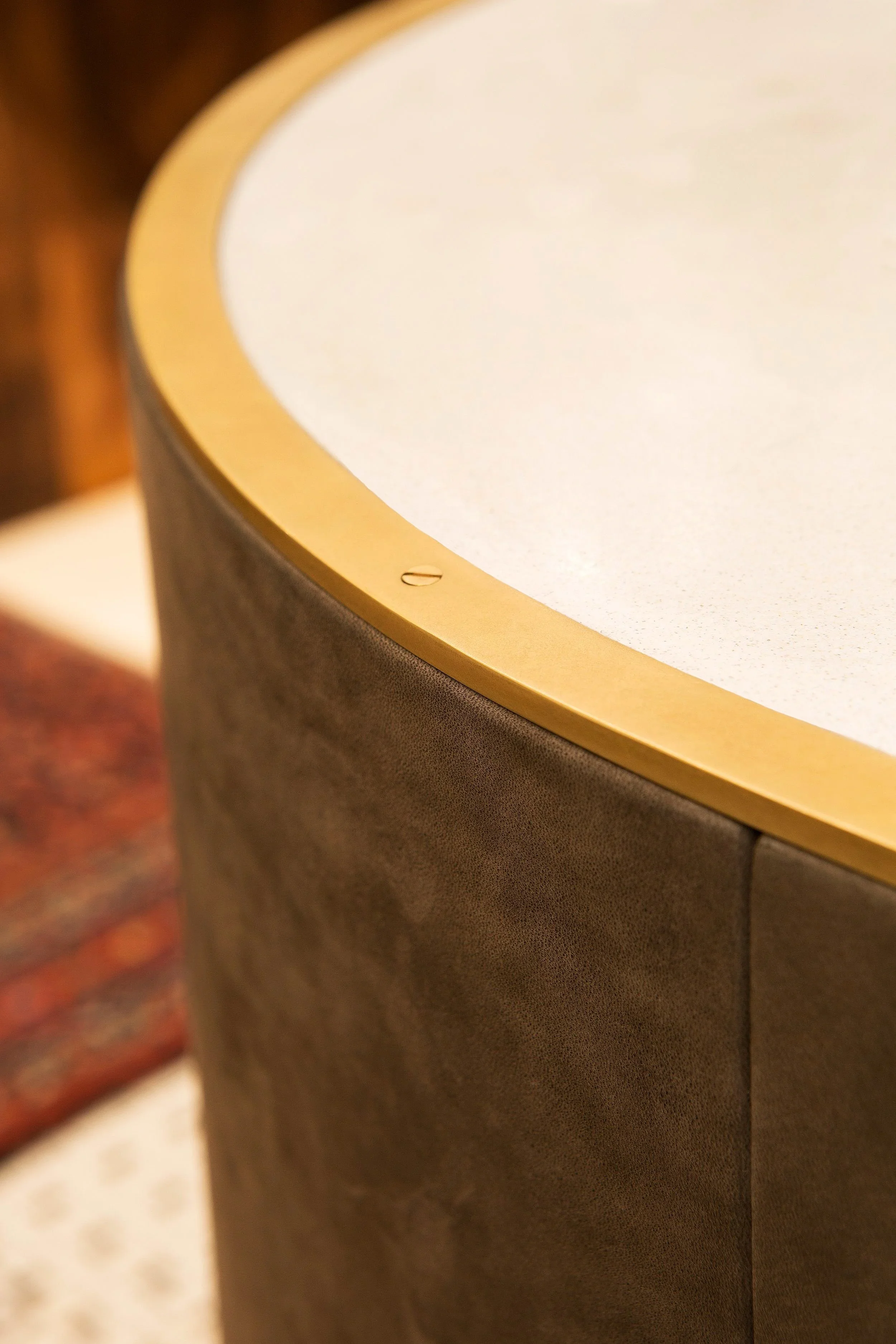 Close detail of custom brass and leather fabrication