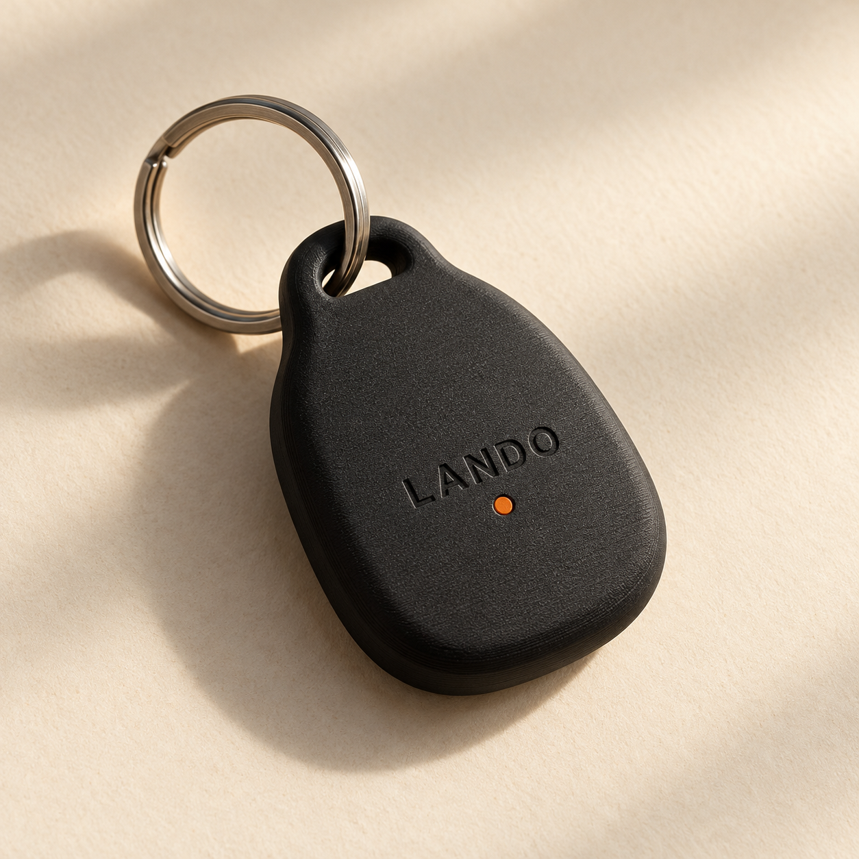 Matte-black custom Lando-branded fob case on a keyring